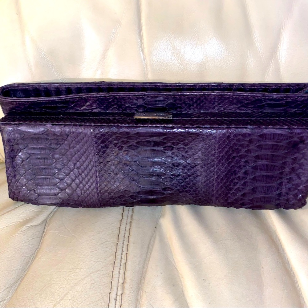 Devi Kroell purple snakeskin clutch‎